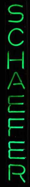 Appraisal: Schaefer Neon Sign Description s Green neon mounted on glass