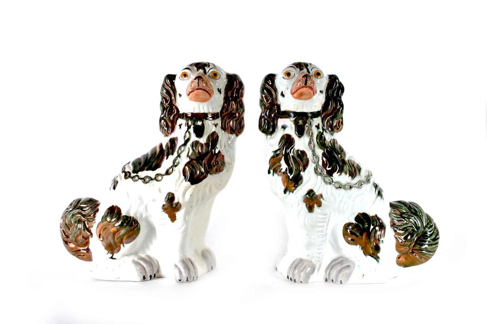 Appraisal: PAIR OF LARGE STAFFORDSHIRE EARTHENWARE SPANIELS nd Half th Century