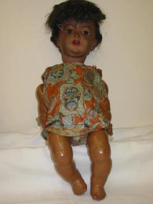 Appraisal: A Kammer Reinhardt bisque head mulatto doll with brown glass