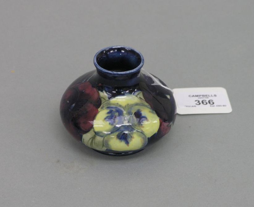 Appraisal: A Moorcroft posy vase 'Pansy' bulbous shape painted initials and