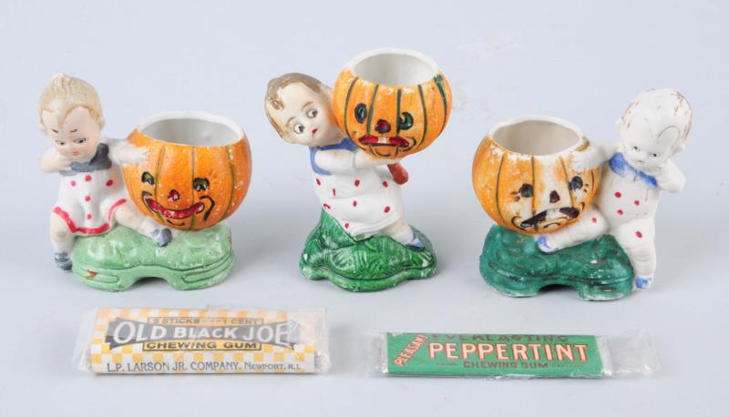 Appraisal: Lot Of Bisque Pumpkin Kids This lot includes three bisque