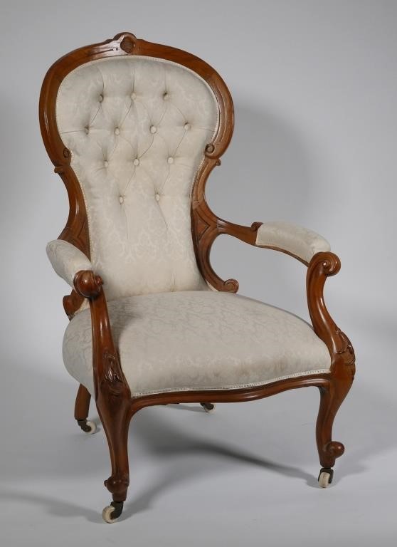 Appraisal: Victorian spoon back arm chair circa Button back upholstered Raised