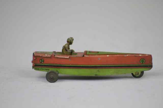 Appraisal: SPEED BOAT PENNY TOY Fischer lithographed tin long nose green