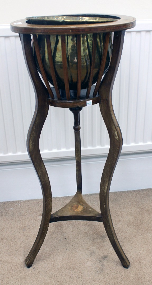 Appraisal: An Edwardian mahogany satinwood crossbanded jardiniere stand boxwood and ebony