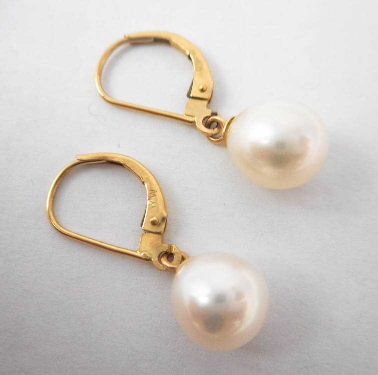 Appraisal: PAIR OF WHITE PEARL EARRINGS each k yellow gold set