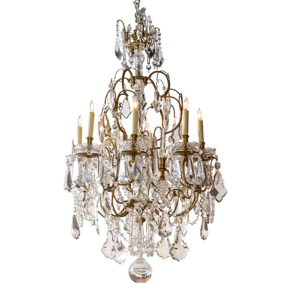 Appraisal: CONTINENTAL GILT BRONZE AND CUT CRYSTAL EIGHT LIGHT CHANDELIER h