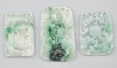 Appraisal: A Group of Three Carved Jadeite Pendant The first carved