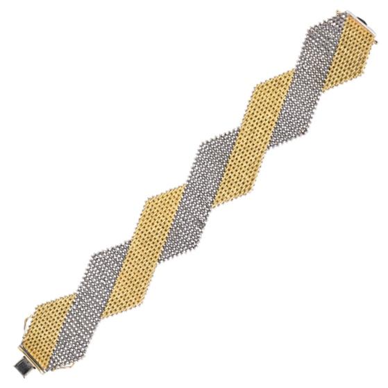 Appraisal: ITALIAN BICOLOR K GOLD MESH BRACELET Highly supple designed as