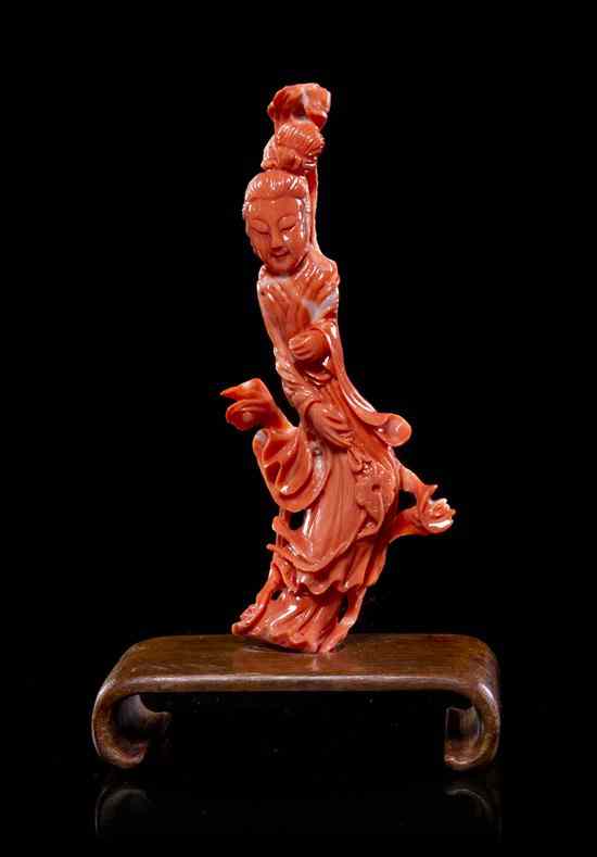 Appraisal: A Carved Coral Figure of a Lady depicted with a