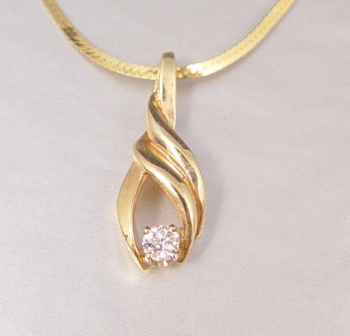 Appraisal: OLD EUROPEAN CUT DIAMOND PENDANT K yellow gold pendant contains