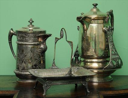 Appraisal: THREE AESTHETIC MOVEMENT SILVERPLATE ARTICLES Including a tilting ice water