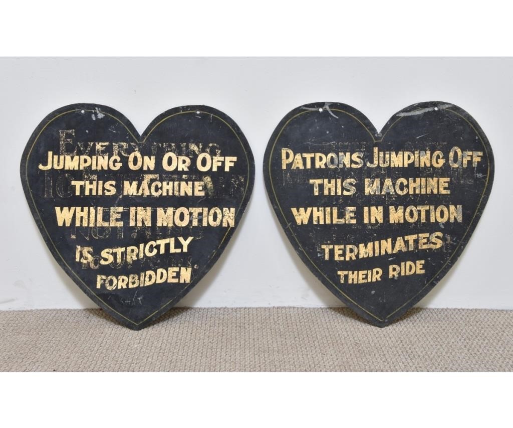 Appraisal: Two heart-shaped galvanized metal signs with stenciled lettering from a