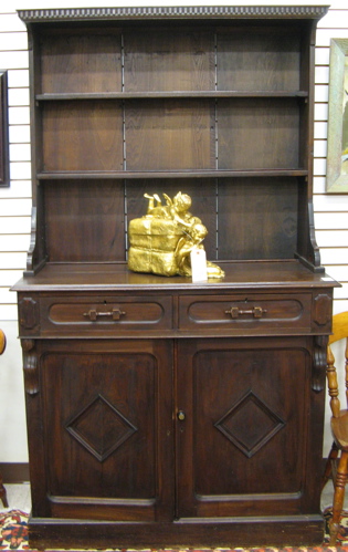 Appraisal: A VICTORIAN OAK AND ASHWOOD HUTCH American last quarter of