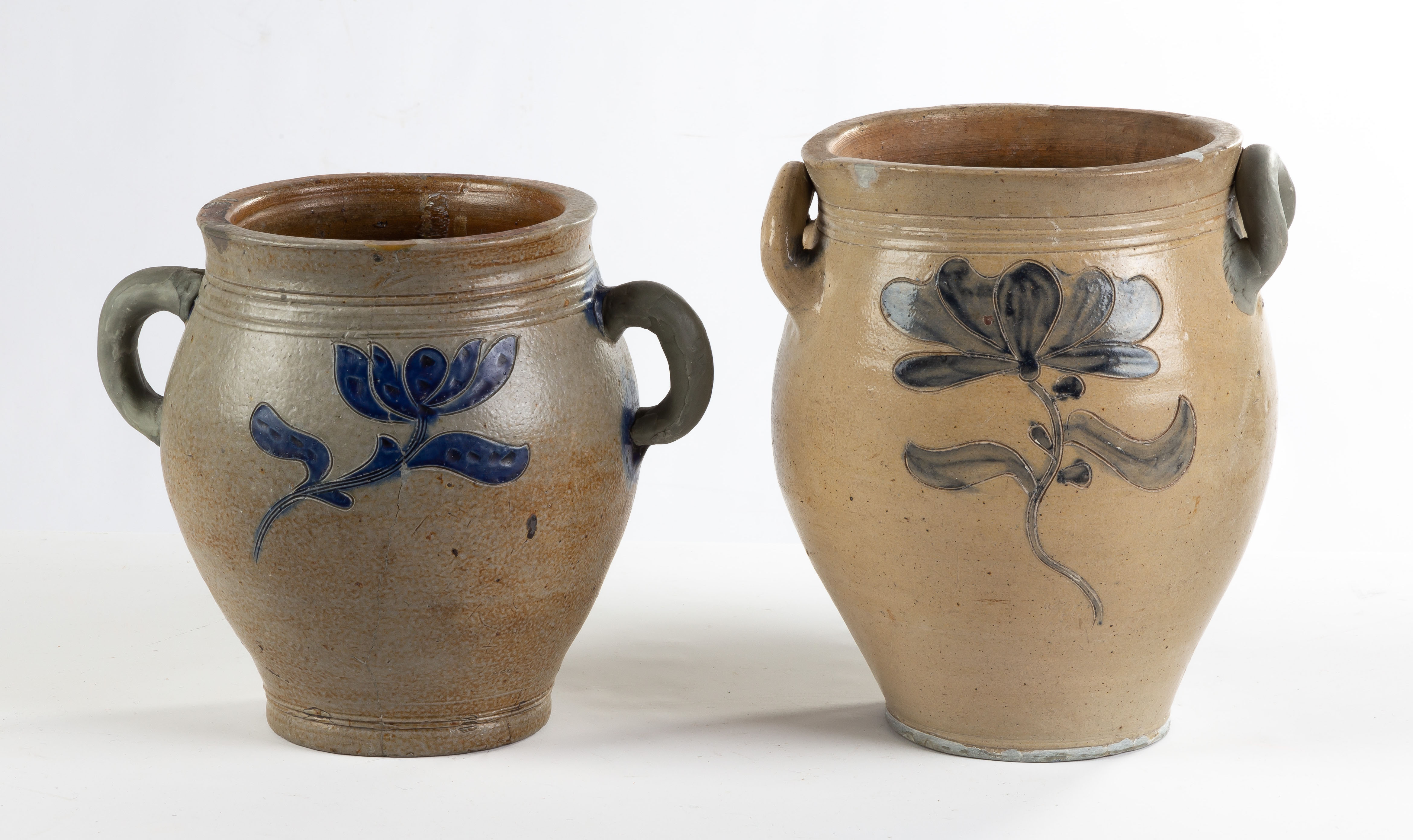 Appraisal: EARLY TH CENTURY STONEWARE CROCKS with incised blue floral decoration