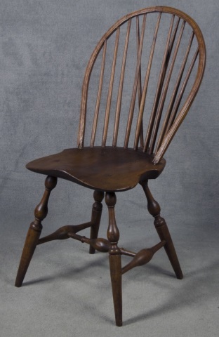 Appraisal: Brace Back Windsor ChairCirca Nine-spindle back With shield-shaped plank seat