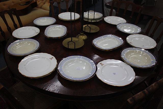 Appraisal: NINE T GOODE CO PORCELAIN DINNER PLATES and a part