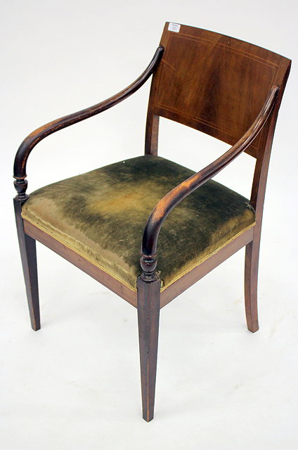 Appraisal: AN EARLY TH CENTURY MAHOGANY OPEN ARMCHAIR the solid back