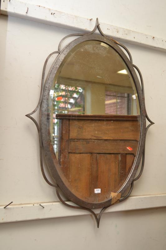 Appraisal: A FRENCH DECORATIVE OVAL SHAPED MIRROR WITH INSET BEVELLED EDGE