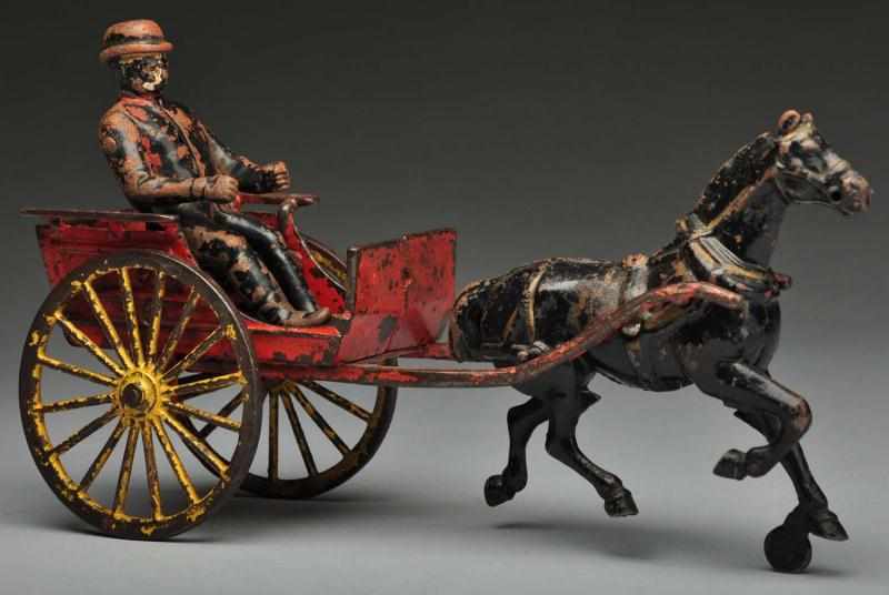 Appraisal: Cast Ion Wilkins Road Cart Horse-Drawn Toy Description American Original