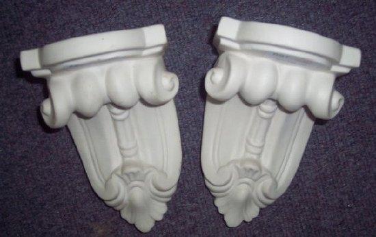 Appraisal: A pair of Victorian parian ware wall brackets with scroll