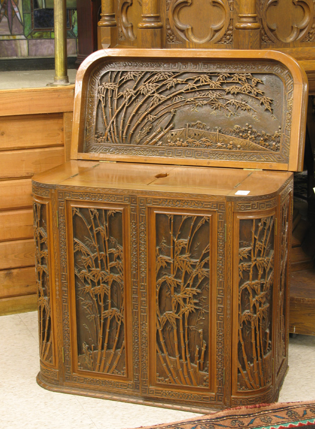 Appraisal: CARVED TEAKWOOD CABINET BAR Chinese th century having a lift