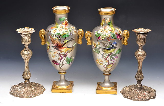 Appraisal: A PAIR OF FRENCH ENAMELLED VASES each decorated birds and