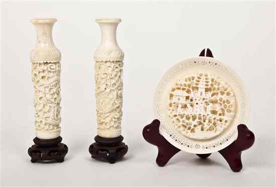 Appraisal: A Pair of Diminutive Carved Ivory Vases having turned mouth