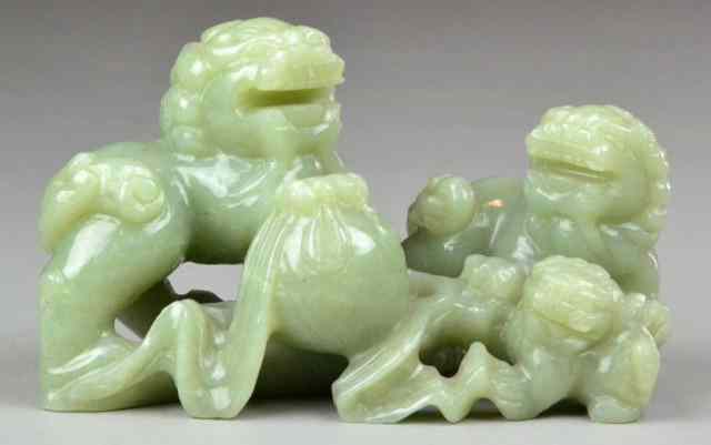 Appraisal: Chinese Jade Figural Carving of Foo DogsCeledon jade carved to