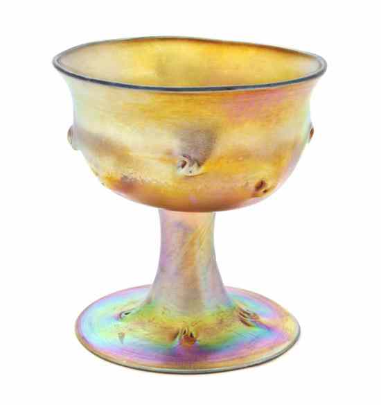 Appraisal: A Tiffany Gold Favrile Glass Goblet the circular bowl raised