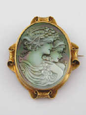 Appraisal: A carat gold tested framed iridescent shell cameo brooch approx