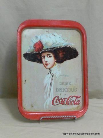 Appraisal: Coca-Cola Metal Serving Tray of a Coca Cola Girl Advertisement