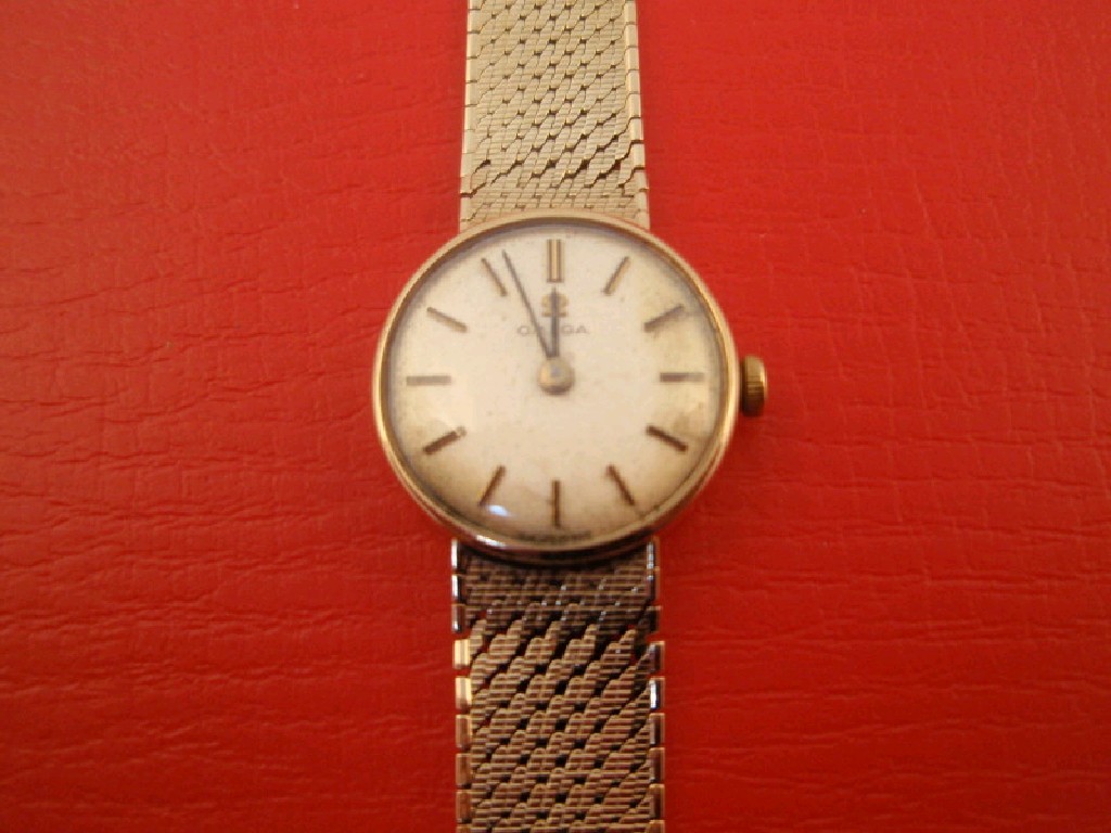 Appraisal: An Omega ladies wristwatch ct case and integral bracelet 's