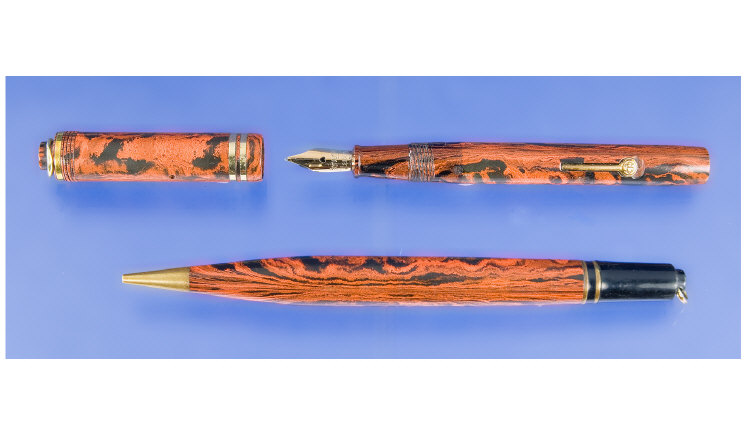 Appraisal: Conway Stewart Dinky Red Mottled Pen and Pencil