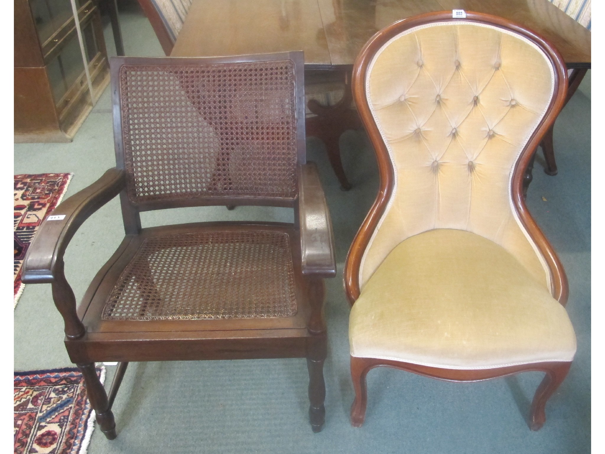 Appraisal: A mahogany cane back armchair and another