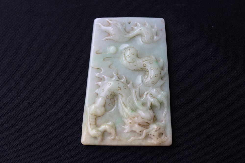 Appraisal: Carved Chinese Jadeite Dragon Pendant Carved Chinese Jadeite Dragon Pendant