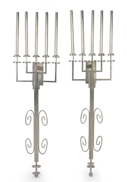 Appraisal: A pair of silvered metal tall five-light wall sconces height