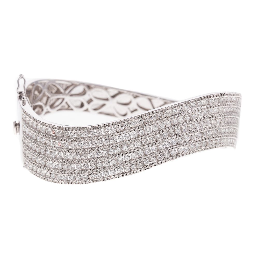 Appraisal: A Ladies Wave Diamond Bangle Bracelet in K K white