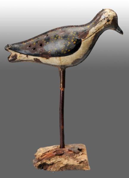 Appraisal: Tin Shore Bird Decoy Description Six small bullet holes on