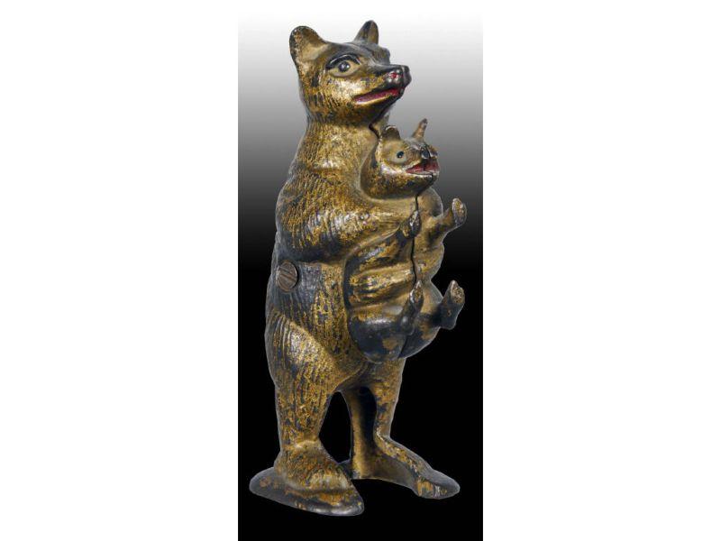 Appraisal: Cast Iron Bear Stealing Pig Still Bank Description - ''