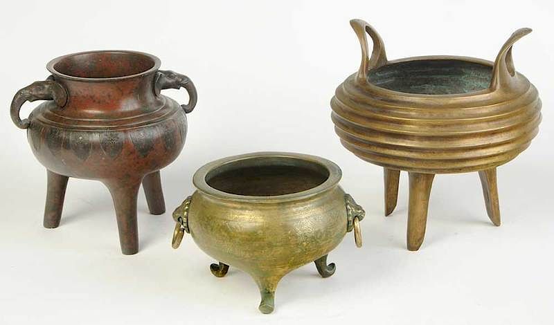 Appraisal: Three Asian Bronze Decorated Censers Ding form one with ribbed