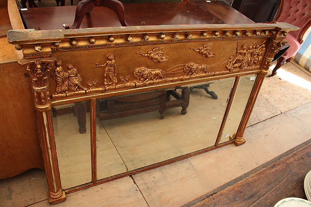 Appraisal: A GILT OVERMANTLE MIRROR with frieze depicting a Classical chariot