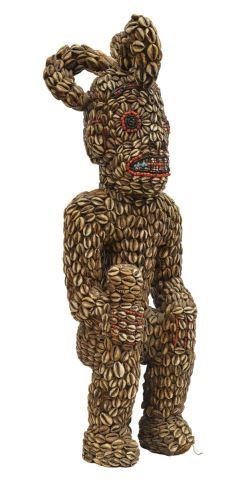 Appraisal: Large African seated commemorative figure possibly Cameroon carved wood clad