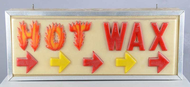 Appraisal: Hot Wax Lighted Advertising Trade Sign Embossed plastic front features