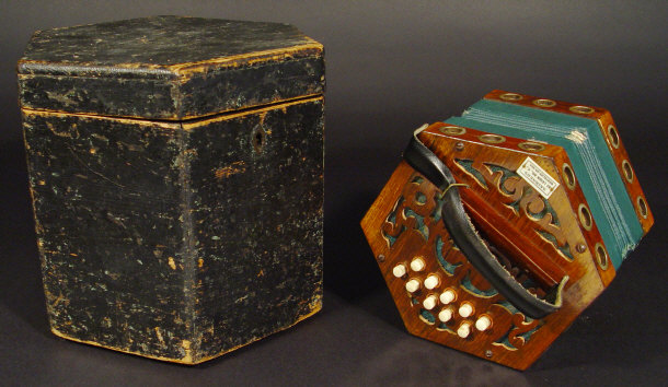 Appraisal: Mahogany and green leather accordion with green leather bellows and