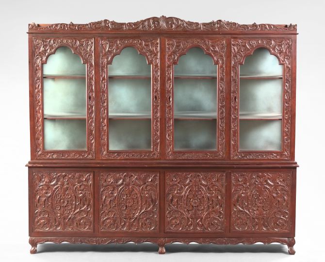 Appraisal: Large and Exuberantly Carved Mahogany Vitrine in two parts the