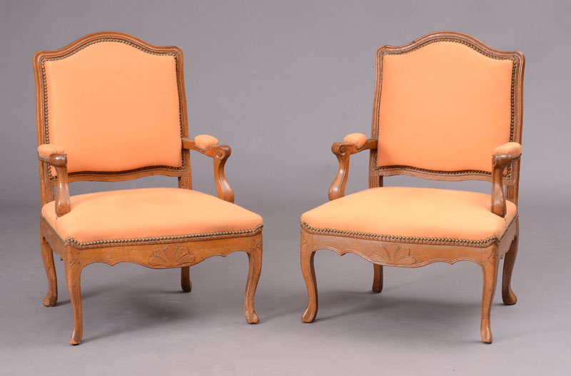 Appraisal: PAIR OF EARLY LOUIS XV PROVINCIAL CARVED BEECHWOOD FAUTEUILS LA