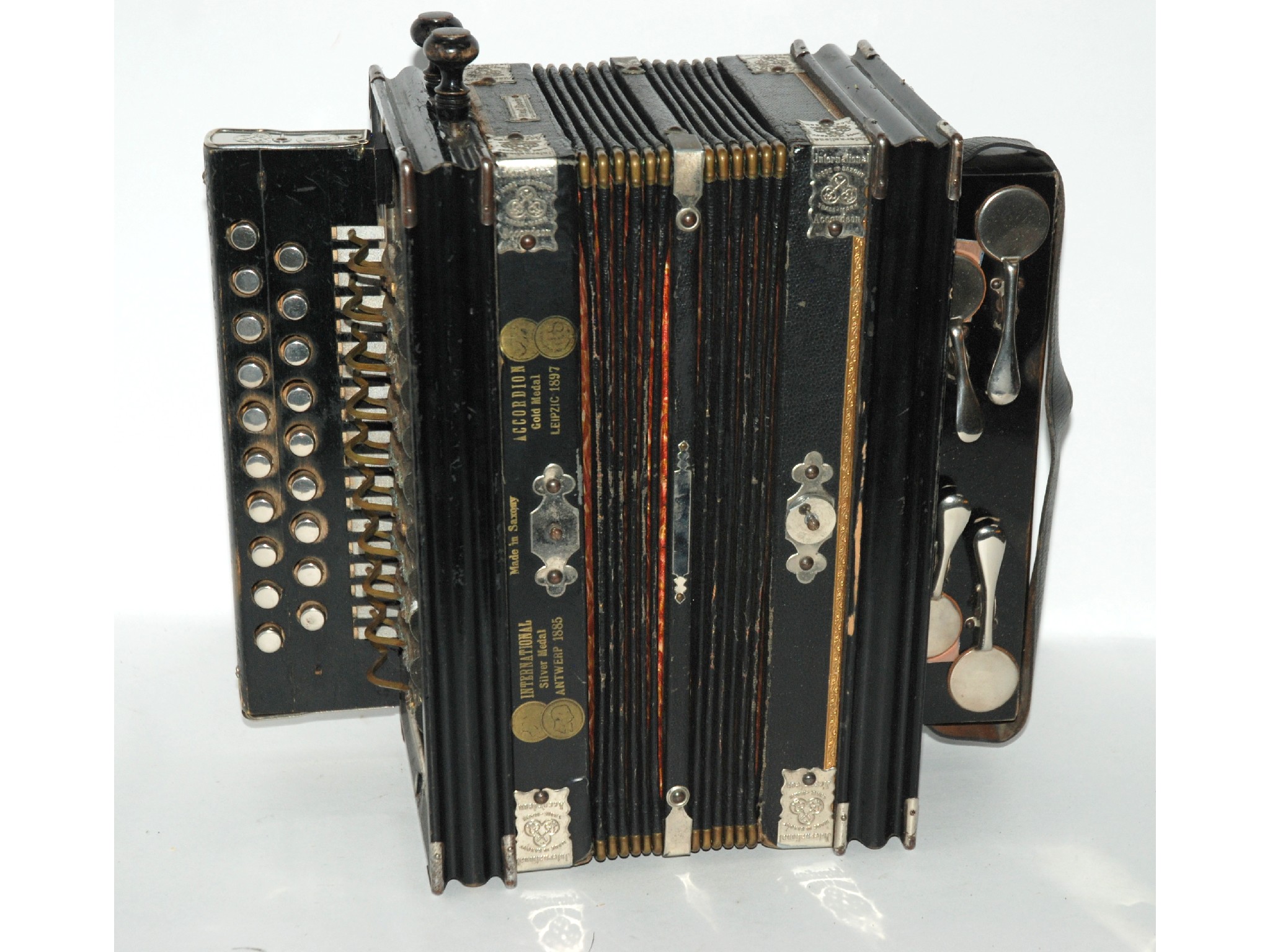 Appraisal: A German cased accordion