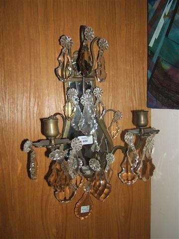 Appraisal: A pair of brass wall sconces with mirrored backs and