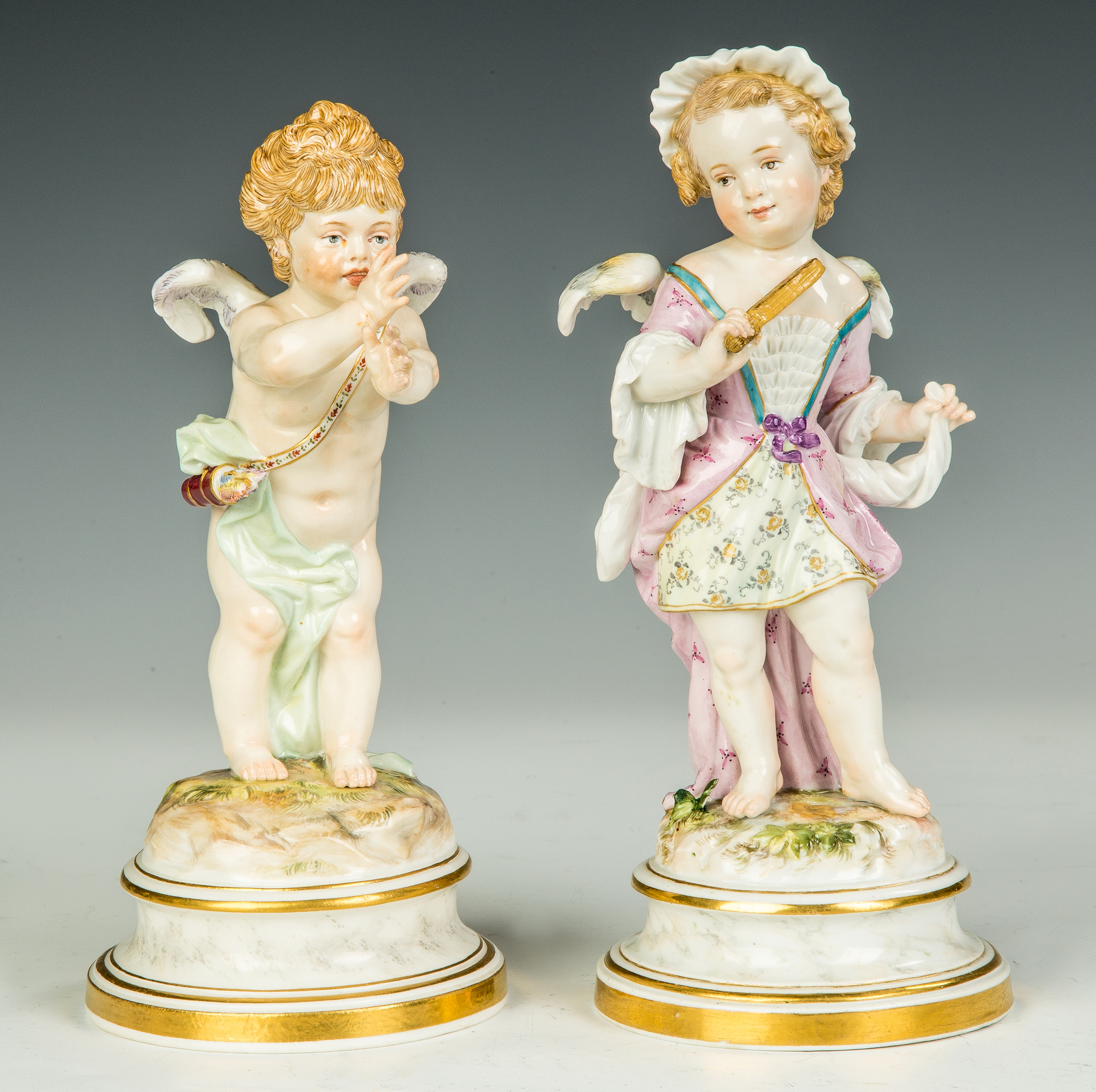 Appraisal: Two Meissen Putti th century Blue crossed swords mark