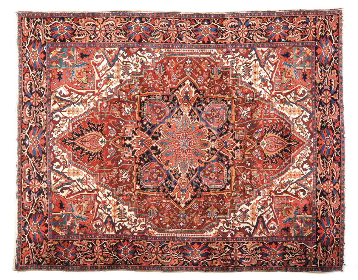 Appraisal: HERIZ CARPET NORTHWEST PERSIA CIRCA The salmon and indigo angular